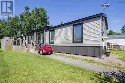 THREE YEAR-OLD MINI-HOME! This mini-home features 1184 square feet of living space with beautiful fl...