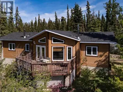 Welcome to your Yukon retreat in beautiful Judas Creek! Just 45 minutes from town, this spacious 2,4...