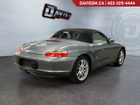The 2003 Porsche Boxster captures the essence of pure roadster driving, a perfectly balanced mid-eng... (image 4)