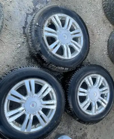 235/65R18 set of Rims & Tires that came off a 2011 Cadillac SRX *Tire Size: 235/65R18 *Season: Winte...