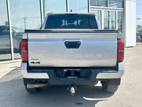 * Suspension: Red TRD sport-tuned shocks for improved on-road handling. * Exterior: 18-inch TRD allo... (image 4)