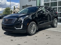 The 2019 Cadillac XT5 Luxury AWD, finished in black with a black leather interior, offers a refined... (image 3)
