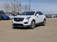The pre-owned 2024 Cadillac XT5 Premium Luxury AWD in Mary Kay Pearl with a Jet Black interior deliv... (image 1)
