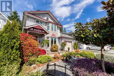 Charming 2-storey heritage-style home on a 6,160 sq.ft. lot with a beautifully landscaped private ba...
