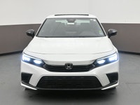 The 2024 Honda Civic Sport is equipped with a 2.0L 4-cylinder engine paired with a smooth front-whee... (image 1)
