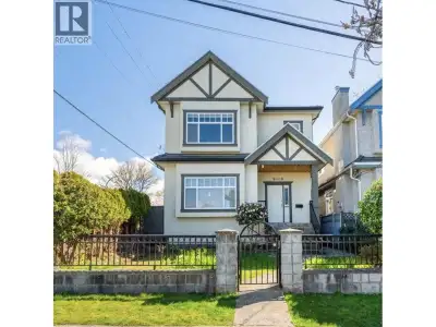 Furnished 3 bedroom, 2 bathroom main-floor home in Marpole, approx. 904 sq ft, with a separate entra...