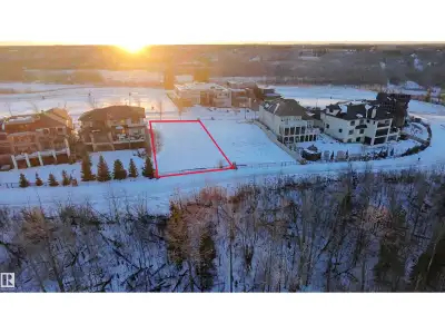 Rare opportunity! Picturesque 11,983 sq.ft. (.27-acre) estate WALKOUT lot featuring a 62-ft wide bui...