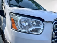 The 2017 Ford Transit Cargo Van in white with an automatic transmission and RWD drivetrain is specif... (image 4)