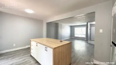 NEWLY RENOVATED 4-BEDROOM STACKED TOWNHOUSE WITH MODERN UPGRADES