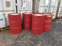 Empty oil drums burn barrels