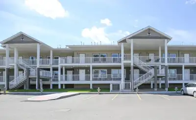 Modern apartments in River Heights just off Lewvan Drive at 2220 Edwards Street. King Edwards Apartm...
