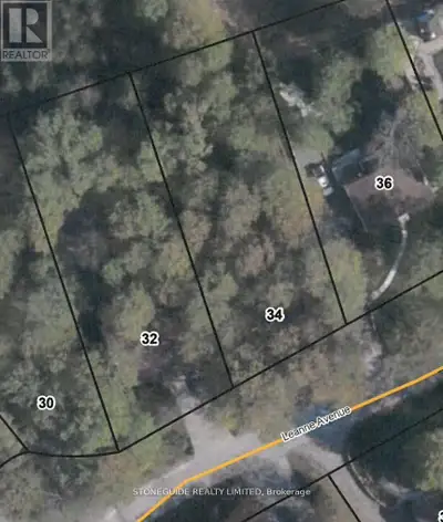Wooded residential building lot in an area of fine homes located on the outskirts of the city of Pet...