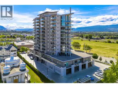 CONCRETE BUILDING, 2 SEPARATE PATIOS WITH VIEWS & SPLIT LAYOUT! Stunning city and mountain views are...