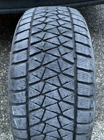 a nice Bridgestone winter tire in great shape with tons of tread (1 TIRE ONLY) size 235/55/18 101T M...