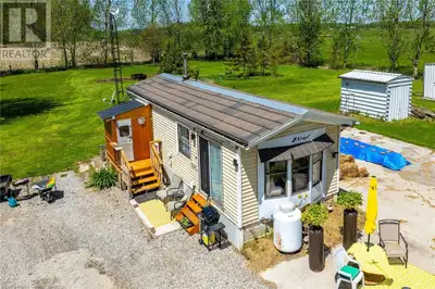 Adorable and affordable country living awaits you with this 4-season mobile home, constructed in 198...