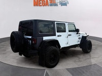 Beautiful 2017 Jeep Wrangler Unlimited Big Bear 4x4! Recently serviced and professionally detailed a... (image 2)