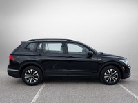 This Volkswagen Tiguan delivers a Intercooled Turbo Regular Unleaded I-4 2.0 L/121 engine powering t... (image 3)