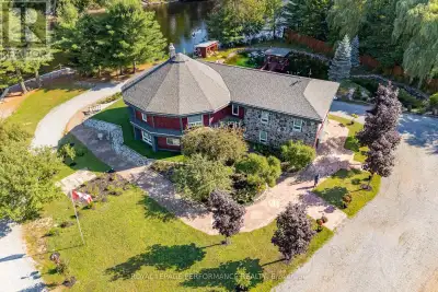 STUNNING one of a kind custom built home on 2.36 acres with ~300 feet of private waterfront shorelin...