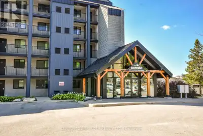 Welcome to 80 Horseshoe Boulevard, Unit 406 at Slopeside Condos, perfectly situated in the heart of...