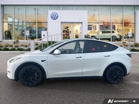 This Tesla Model Y boasts a Electric engine powering this Automatic transmission. Wireless Phone Con... (image 1)