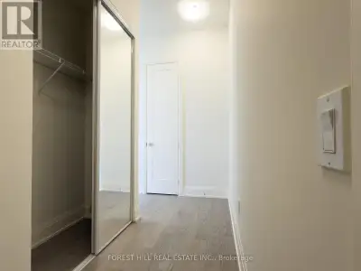 Experience modern urban living in this brand new, never-lived-in penthouse suite, offering approxima...