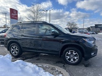 Conquer every adventure with the rugged yet refined 2023 Honda Passport TrailSport, a vehicle engine... (image 3)