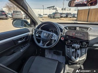 This 2022 Honda CR-V LX is powered by a 1.5L turbocharged I4 engine paired with a smooth CVT transmi... (image 9)