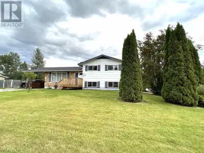 MLS® #R2842531 Four level split on large corner lot. Main features living room with w/b fireplace op...