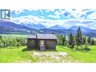 Nestled along the scenic Columbia Valley in Brisco, BC, this beautifully appointed two-storey home i...