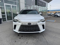 Curbside, this 2026 Lexus RX350h Premium expresses its sophisticated style with a sleek body design... (image 4)