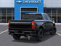The 2026 Chevrolet Silverado 1500 RST, in its striking black exterior and matching black interior, i... (image 3)