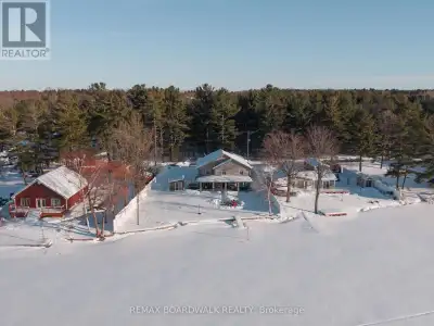 Welcome to this waterfront retreat on sought-after Graham Lake, where custom craftsmanship and luxur...