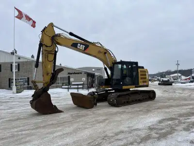 Iron Inventory Inc! 2014 Caterpillar 320ELRR is powered by a 164hp diesel engine. Enclosed heated ca...