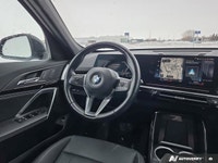 This 2023 BMW X1 xDrive28i is powered by a 2.0L turbocharged I4 engine paired with a responsive 7-sp... (image 9)