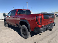 AMVIC Licensed Dealer The 2026 GMC Sierra HD AT4X AEV Edition in Volcanic Red Tintcoat is engineered... (image 5)