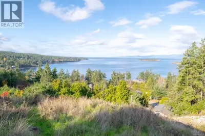 Discover an exceptional opportunity to build your dream home in picturesque Nanoose Bay. This expans...
