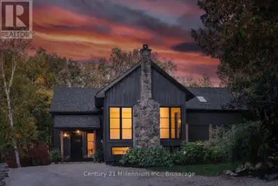 Welcome to your peaceful oasis tucked into the trees - an impeccably designed, fully renovated moder...