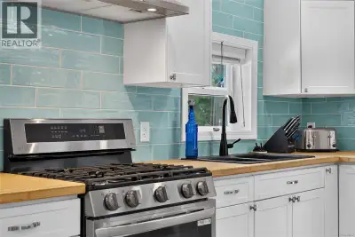 Exceptionally updated home offering the modern expansive feel of a detached rancher. This 3-bed + bo...