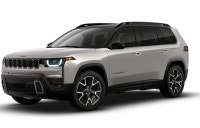 The 2026 Jeep Cherokee Overland, presented in a sleek gray shade and equipped with a robust 4x4 driv... (image 4)