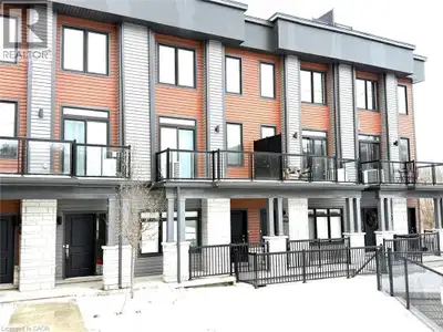 Beautiful exquisite townhome located in spectacular location with surrounding views of Grand River i...
