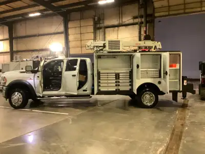 Brand New Ram 5500 4x4 crew cab w/ Summit service body. -6k hydraulic crane (6,000lb capacity, 20ft...