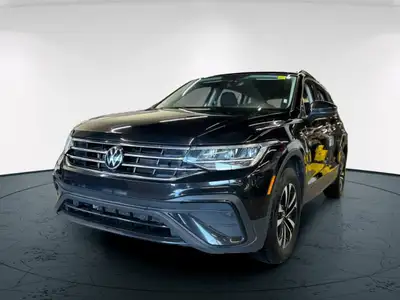 The 2024 Volkswagen Tiguan Trendline 4MOTION in black is an impressive AWD SUV that offers remarkabl...
