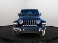 This Jeep Wrangler has a strong Gas/Electric V-6 3.6 L/220 engine powering this Automatic transmissi... (image 5)