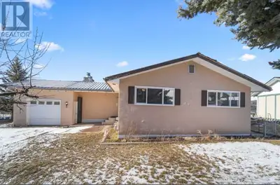 Investment Opportunity! Looking for a rancher with a basement? This beautifully renovated home offer...