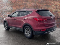 KBB.com 5-Year Cost to Own Awards. This Hyundai Santa Fe Sport has a durable Regular Unleaded I-4 2.... (image 2)