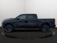 This 2026 RAM 1500 REBEL CREW CAB 4X4 has the following options Lux Leather Trimmed Bucket Seats, Re... (image 1)