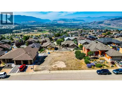 Build your dream home on this exceptional 0.232-acre lot at 1408 Red Mountain Place, with breathtaki...