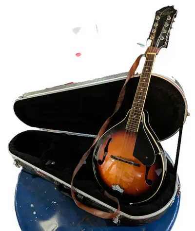 Oscar Schmidt A-Style Mandolin with a tobacco sunburst finish, dual F-holes, a teardrop A-style body...