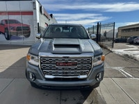 The 2022 GMC Canyon Denali long box is presented as a in.right-sizedin. luxury midsize truck that of... (image 1)