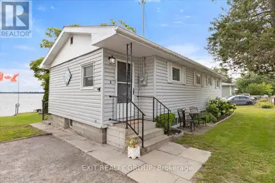 EXPERIENCE THE VERY BEST OF ONTARIO COTTAGE LIVING! Welcome to your private waterfront escape on Eas...